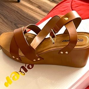 Couple shoes that had never been worn as well as dresses